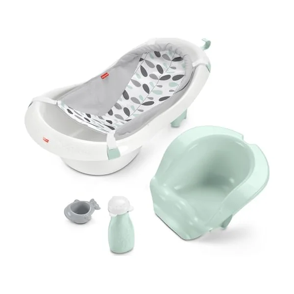 Fisher-Price 4-in-1 Sling 'n Seat Tub full kit at a three-quarter angle, with the leaf-pattern mesh sling installed in the white tub beside the mint seat and toys