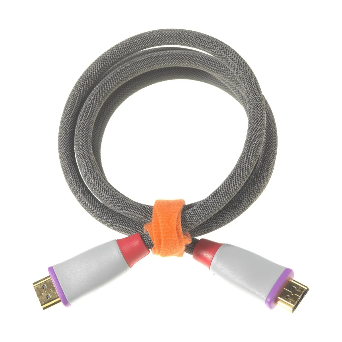 Orange VELCRO Brand ONE-WRAP thin tie bundling a coiled braided HDMI cable