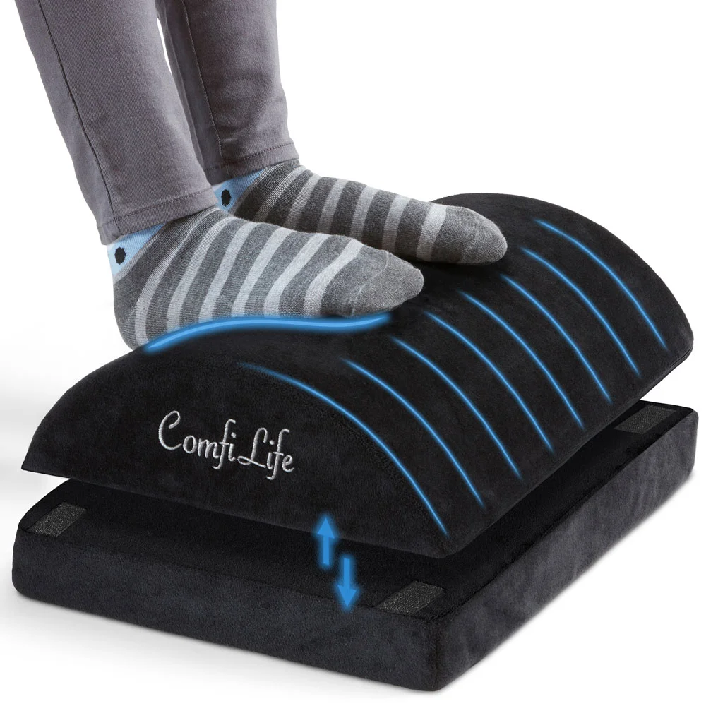 ComfiLife Foot Rest black memory foam with feet resting on ergonomic arch surface
