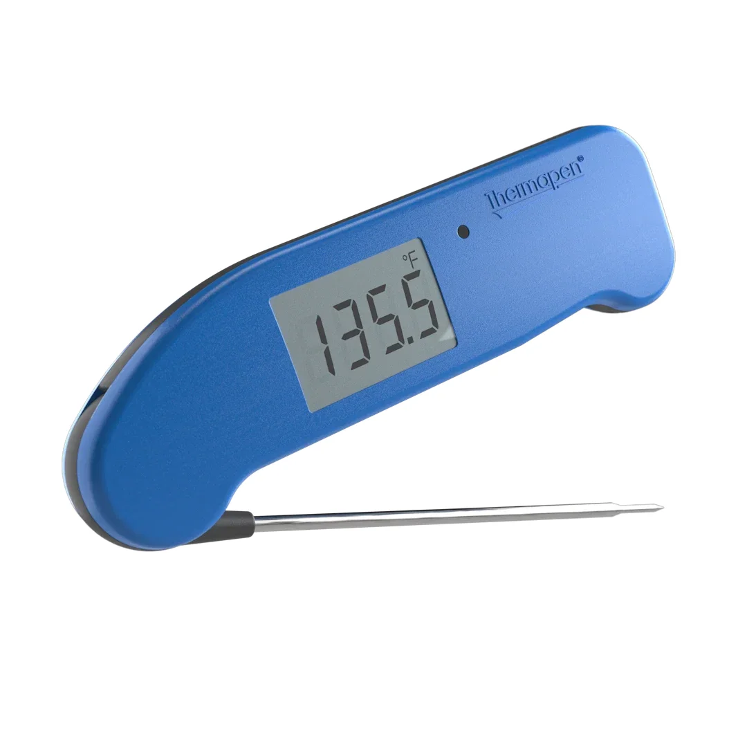 ThermoWorks Thermapen ONE in blue at a 3/4 angle with the fold-out probe extended