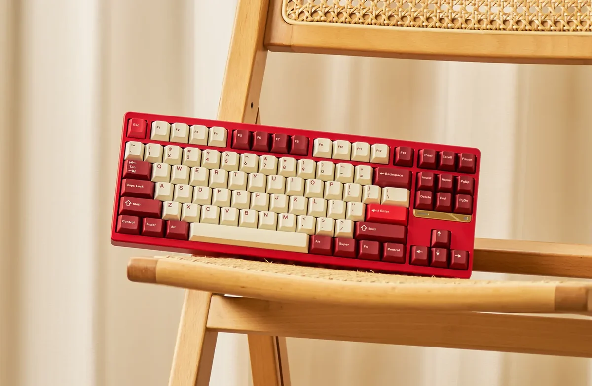 Evo Works Evo 80 Scarlet colorway in lifestyle shot resting on rattan chair