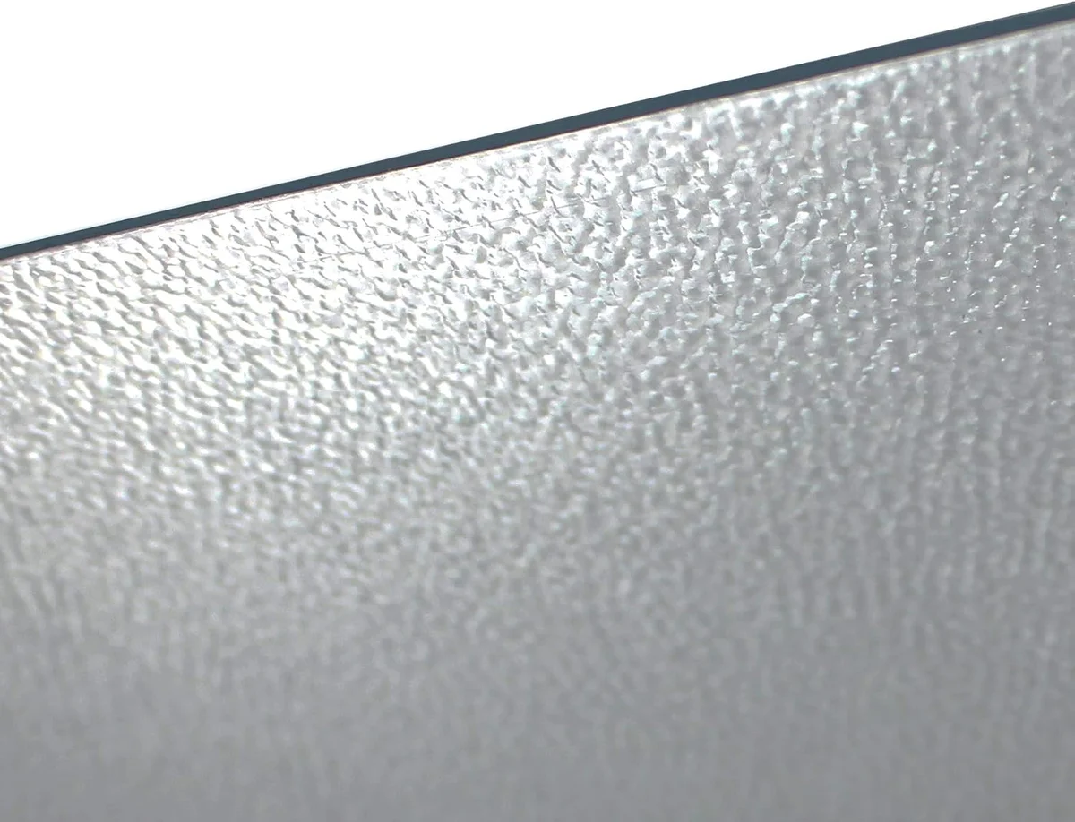 Close-up of the beveled edge and clear surface of the Marvelux chair mat
