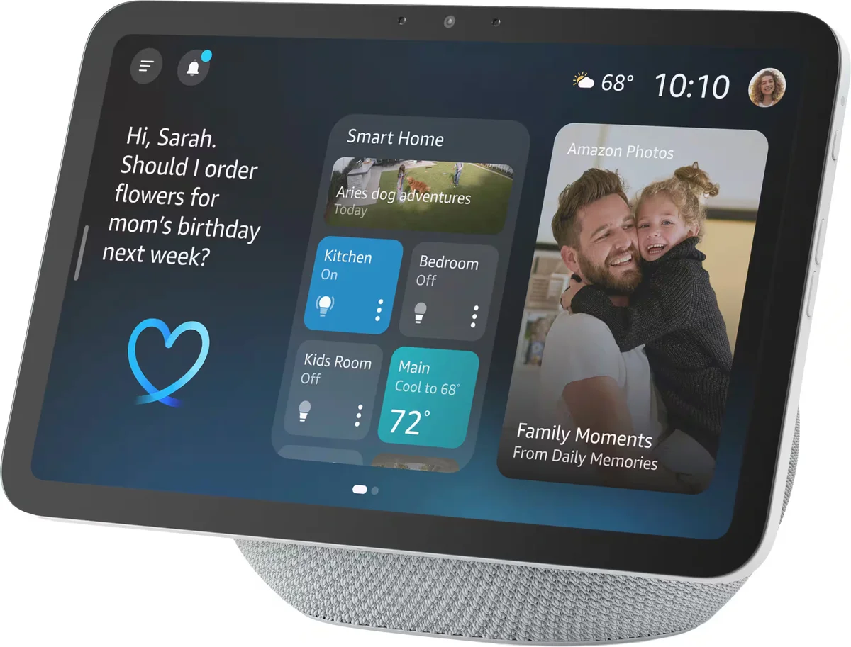 Amazon Echo Show 8 (2025) in Glacier White on white background, alternate 3/4 angle showing the fabric-wrapped orb speaker base and home screen widgets