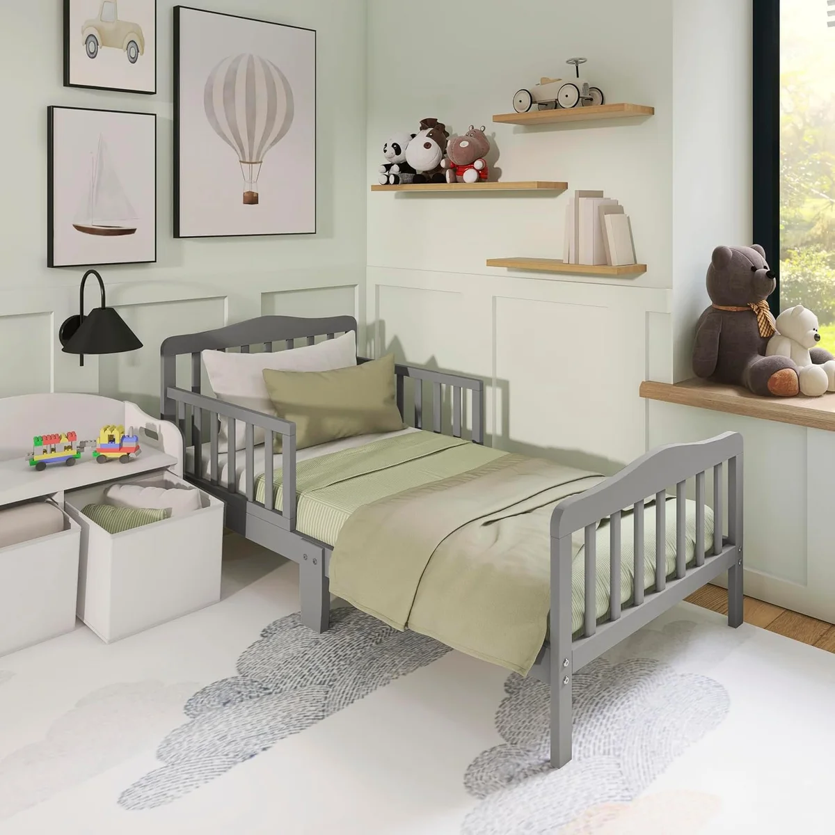 Dream On Me Classic Design Toddler Bed in grey styled in a decorated nursery room
