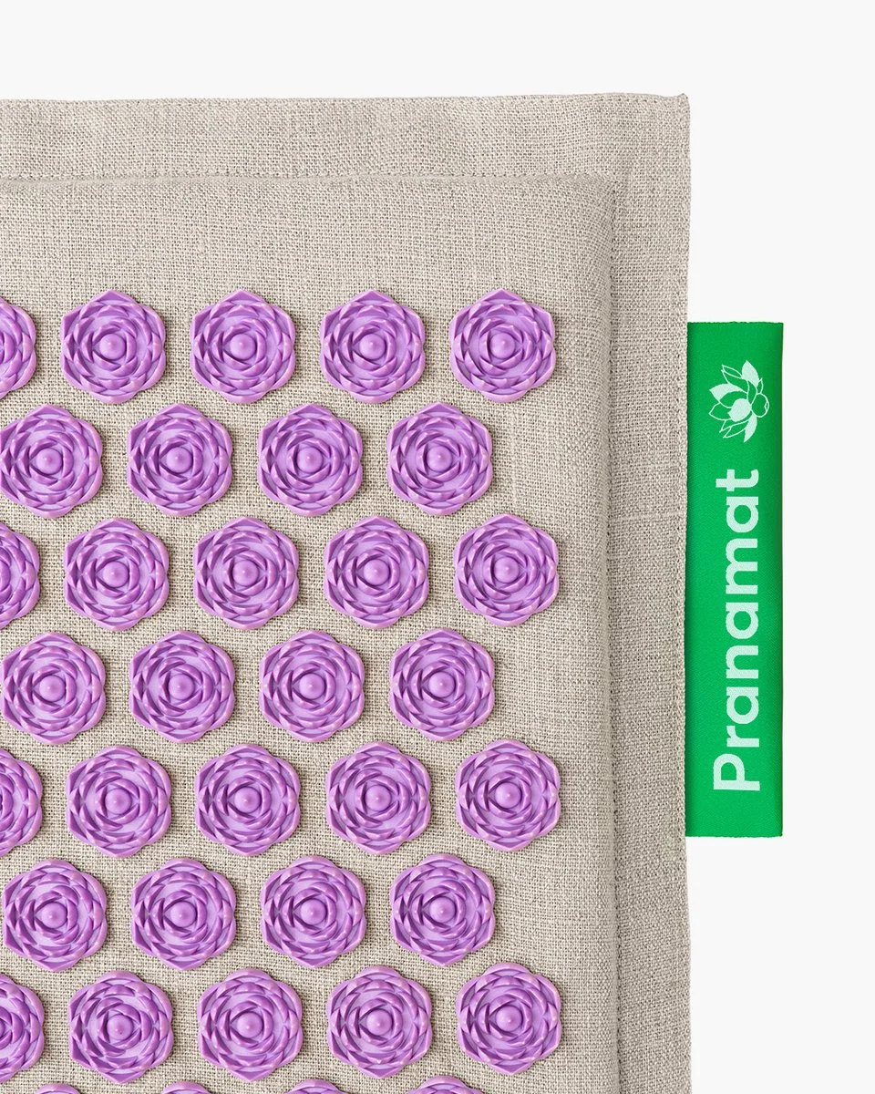 Pranamat ECO mat and pillow set shown at an angle on white