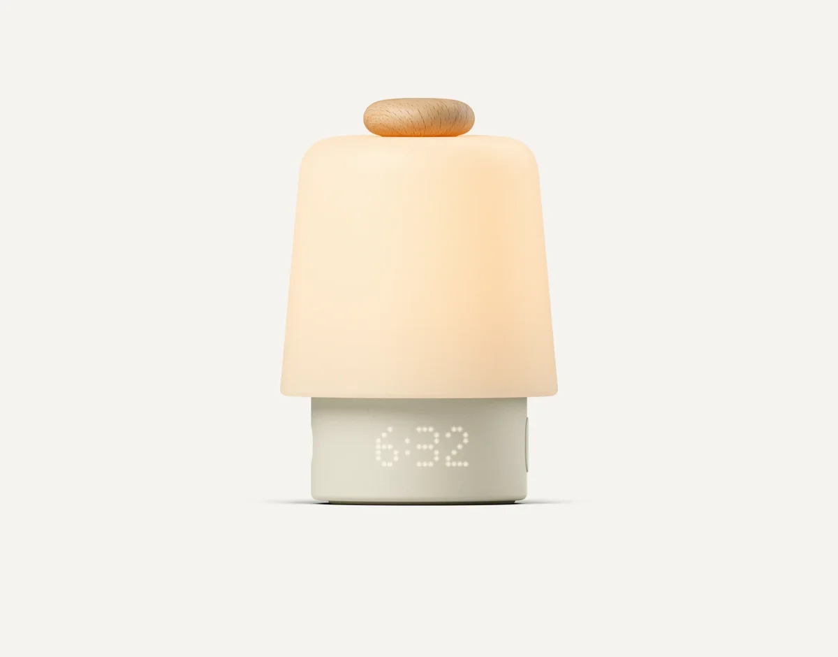Hatch Baby Rest Gen 2 front view with beechwood knob and clock display