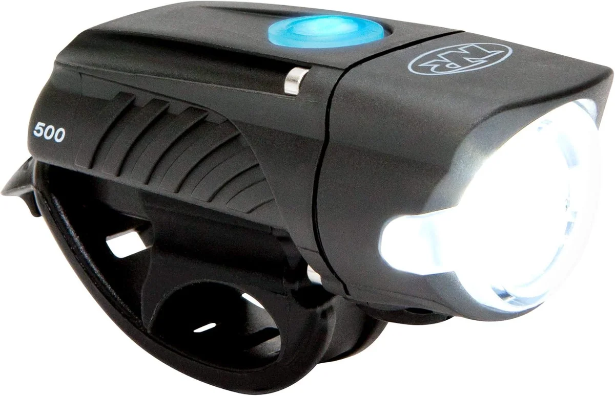 NiteRider Swift 500 front-facing view with beam illuminated on white background