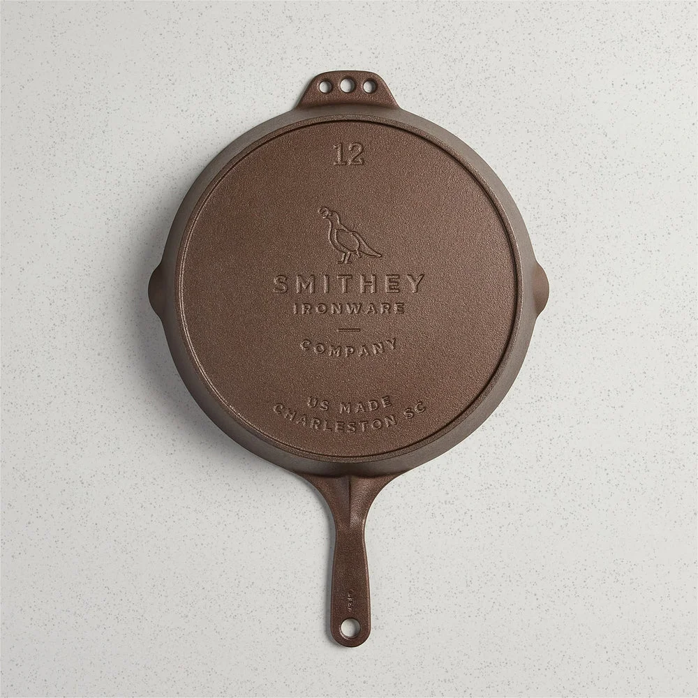 Smithey No. 12 skillet underside showing the embossed Smithey Ironware Company logo and Charleston SC markings