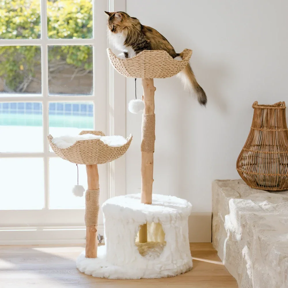 Mau Cento Modern Cat Tree from a 3/4 angle with a long-haired cat perched atop the woven top basket