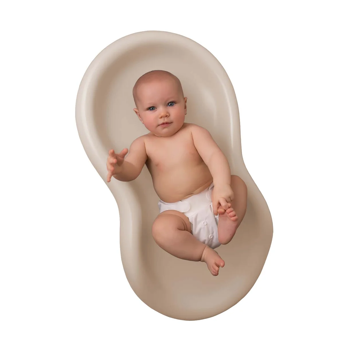 Keekaroo Peanut Changer with baby nestled inside, showing the deep cradling ledge that keeps infants centered