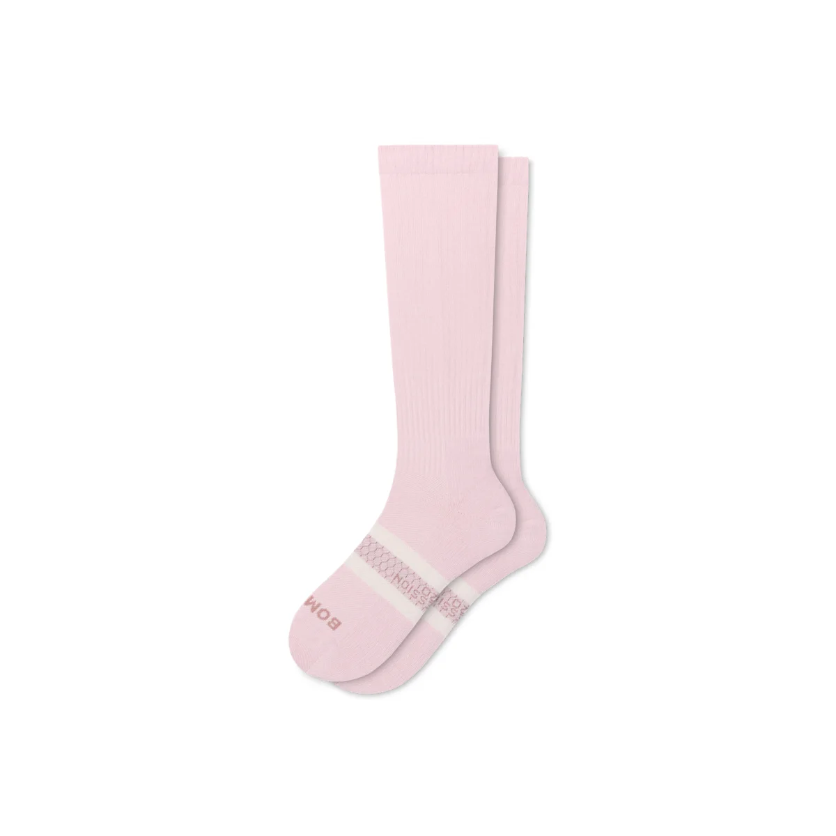 Bombas Everyday Compression Socks in rosewater pink, knee-high, laid flat showing ribbed knit and compression footbed stripe