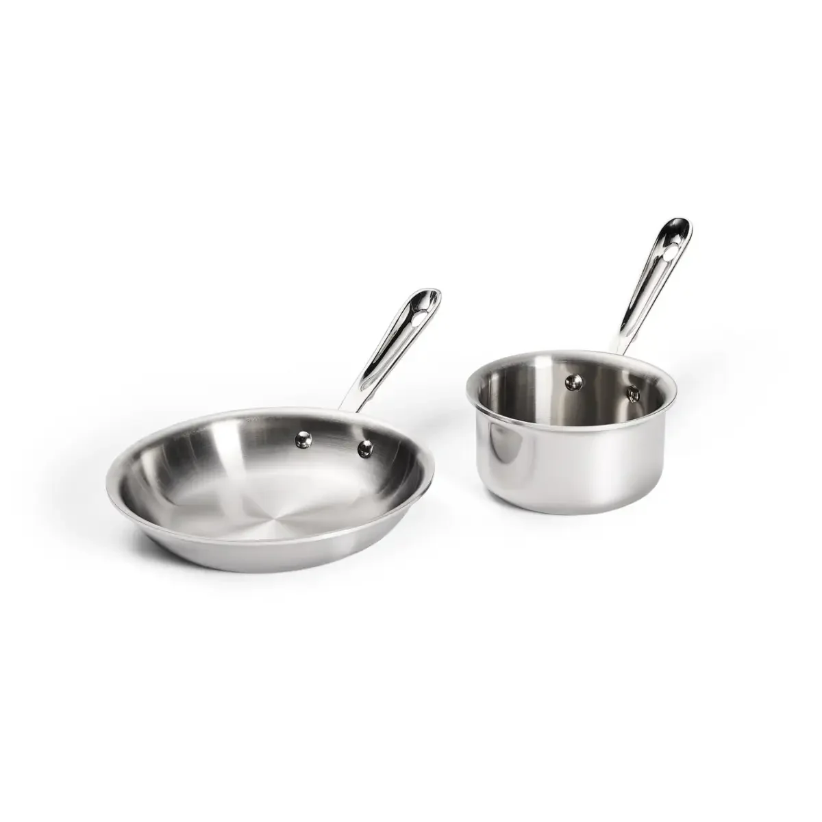 All-Clad D3 Stainless fry pan and saucepan close-up showing the tri-ply construction and cupped handle