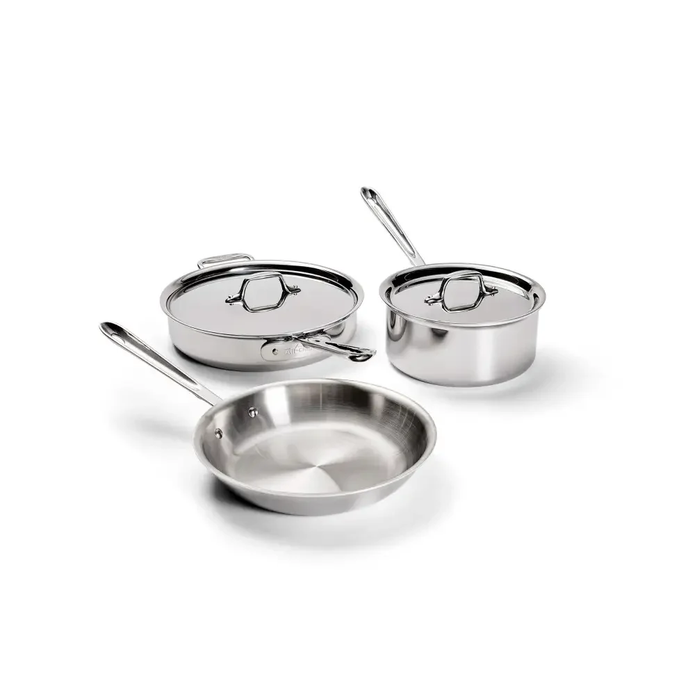 All-Clad D3 Stainless saute pan, saucepan, and fry pan grouped together showing mirror-polished finish