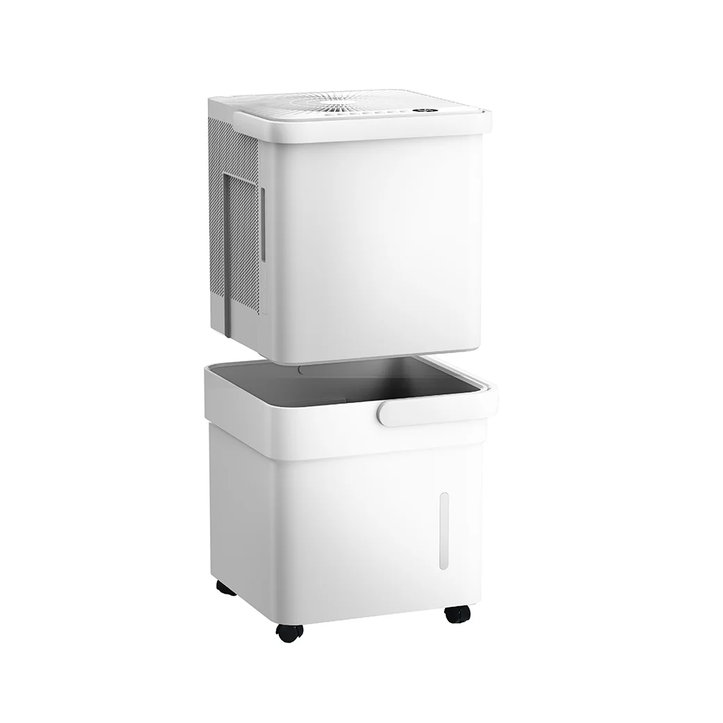 Midea Cube 50-Pint Smart Dehumidifier shown separated into its two stackable cube sections revealing the nested collection bucket