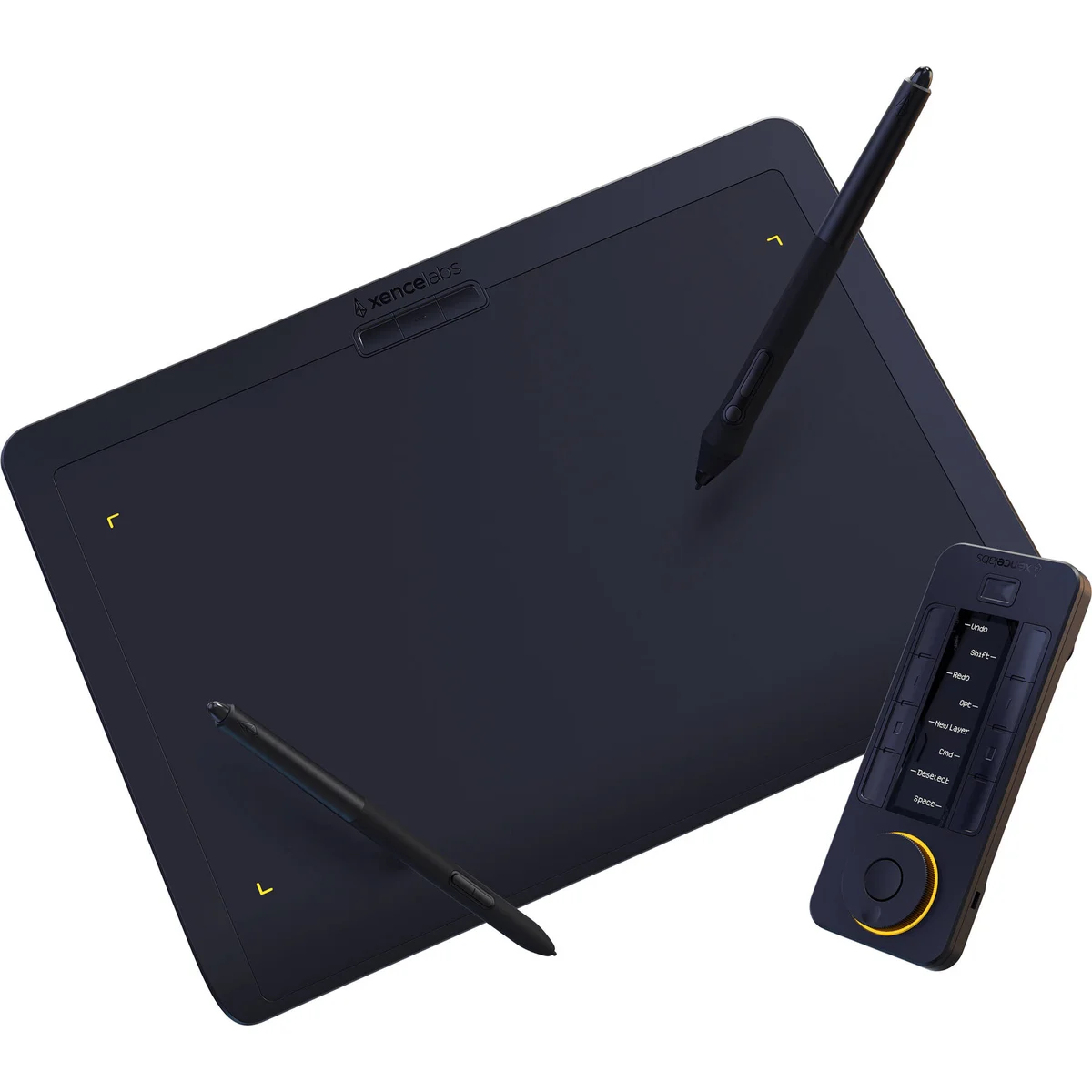 Xencelabs Pen Tablet angled overhead view with both pens on drawing surface and Quick Keys remote showing OLED display