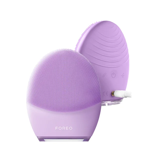 FOREO LUNA 4 facial cleansing device front and back view showing silicone touchpoints and USB charger