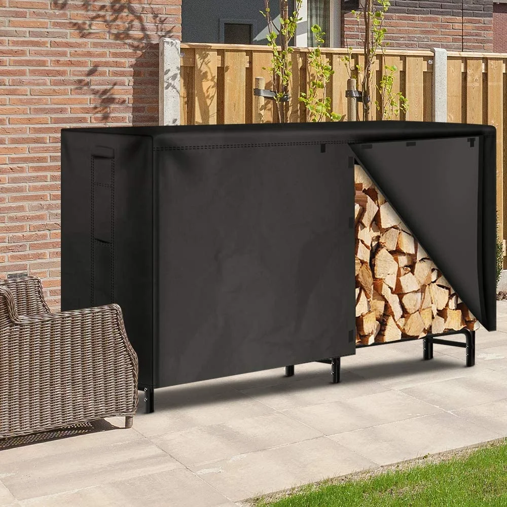 Amagabeli 8ft firewood rack with cover installed on a brick patio beside a fence, cover flap open exposing stacked firewood