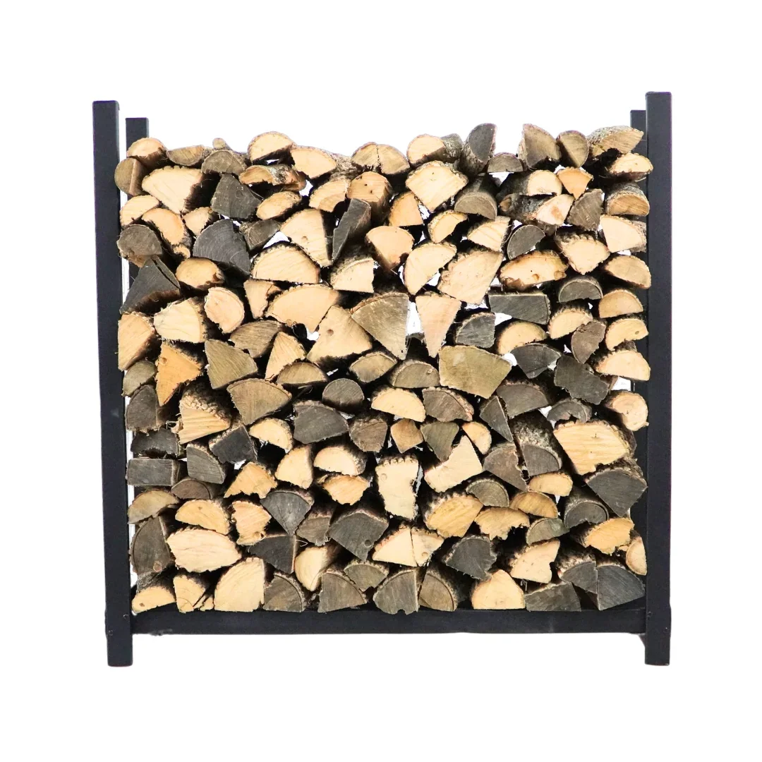 Woodhaven firewood rack fully loaded with split logs, no cover, showing the open welded black steel frame
