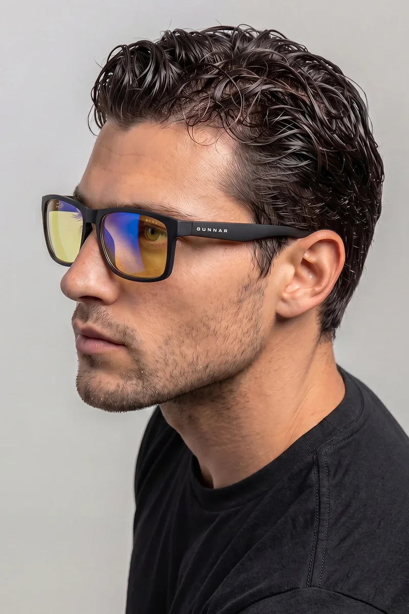 Man wearing Gunnar Optiks Intercept gaming glasses, lifestyle in-use shot