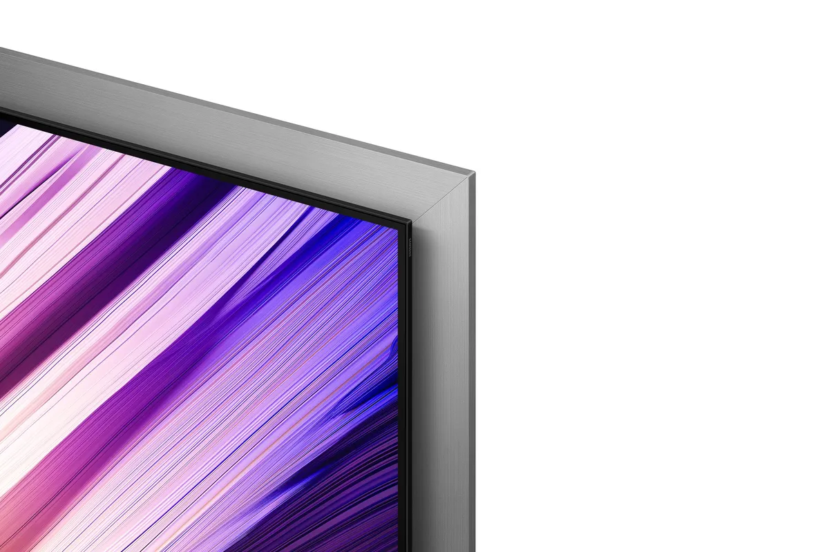 Samsung S95H close-up of the brushed metal frame around the matte screen corner