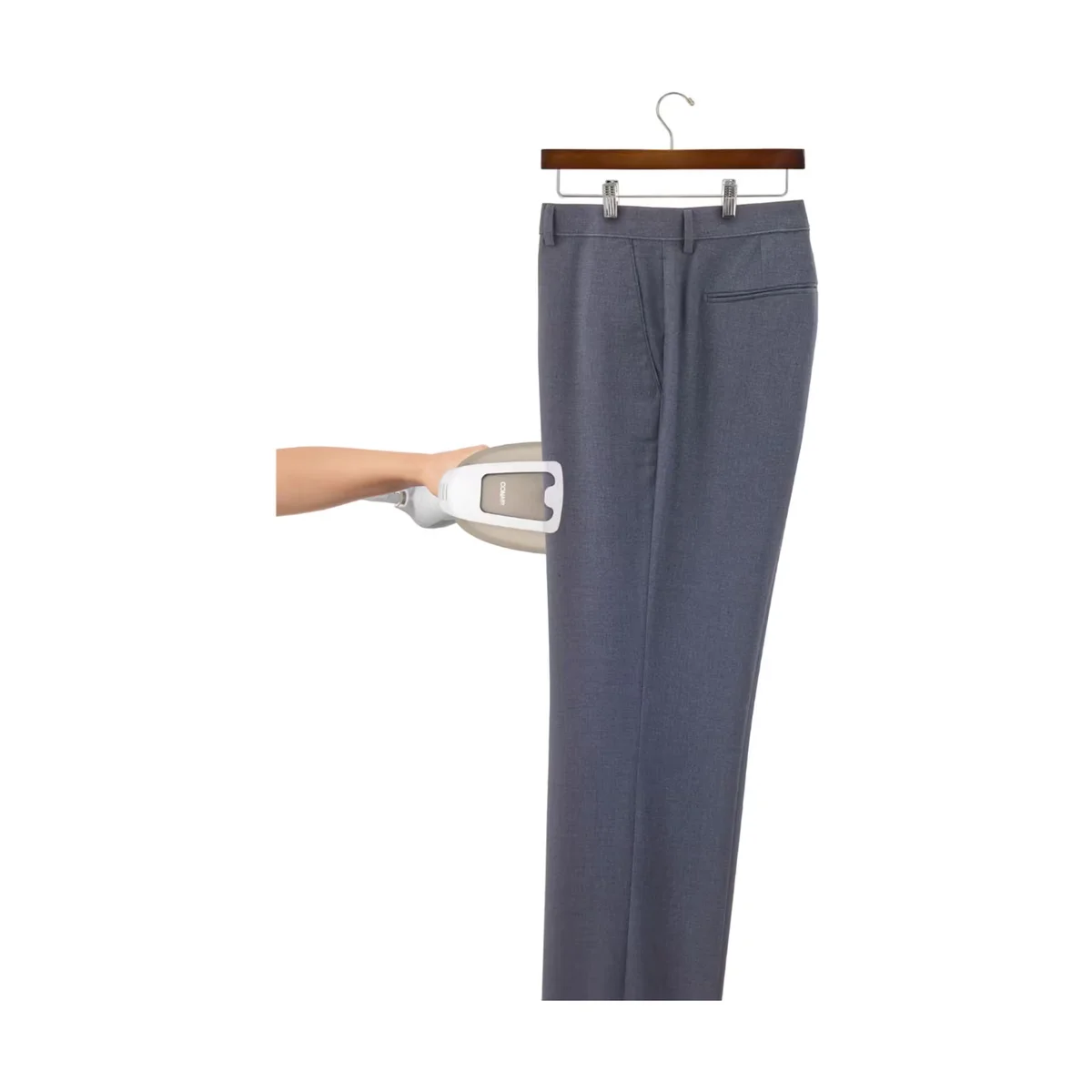 Conair Turbo ExtremeSteam GS59X in use, steaming wrinkles from hanging trousers on a clothes hanger