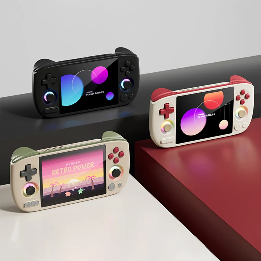 AYANEO Pocket Air Mini in all three colorways — Aurora Black, Retro White, and Retro Power — showing RGB Hall sticks