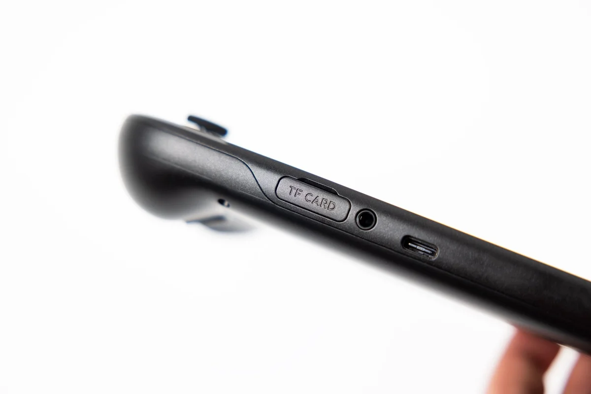 Retroid Pocket 6 bottom edge close-up showing TF card slot, headphone jack, and USB-C port