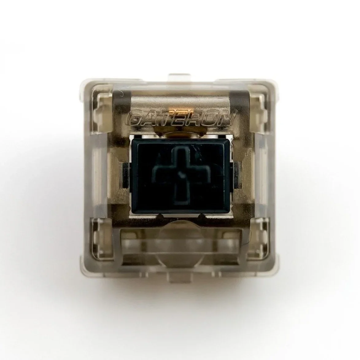 Gateron Ink Black V2 switch top-down view showing black cross-point stem and internal mechanism