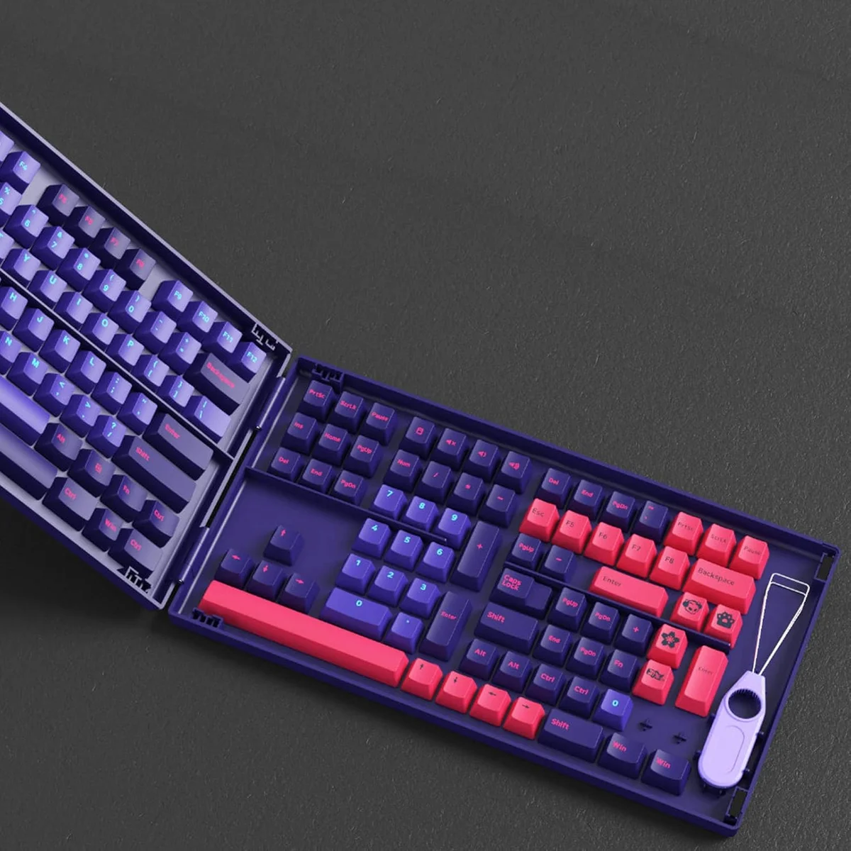 Akko Doubleshot PBT Neon keycap set in open collection case, angled view showing gradient purple-to-pink colorway
