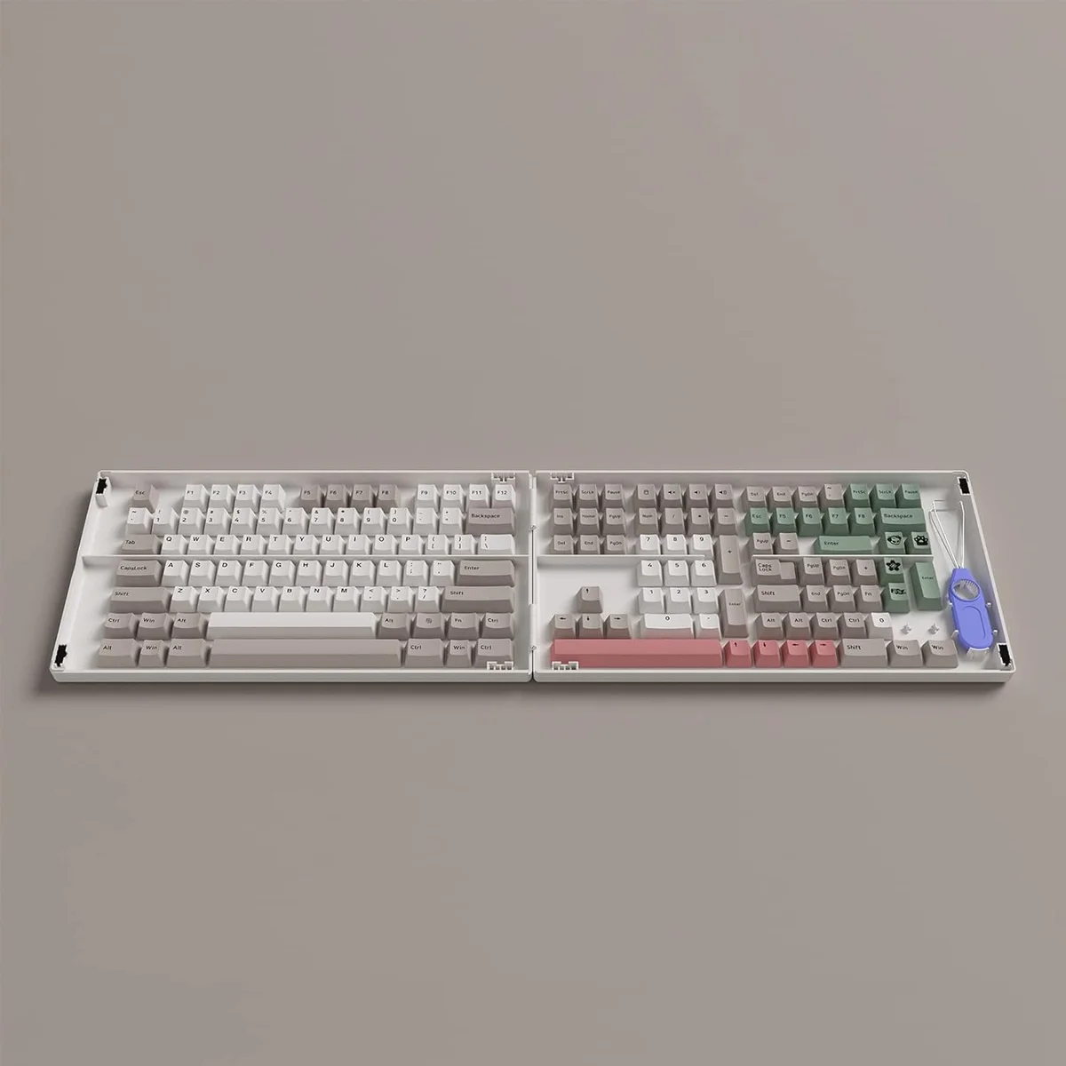 Akko 9009 Retro Doubleshot PBT keycap set in open tray, overhead view showing beige, sage green, and pink colorway