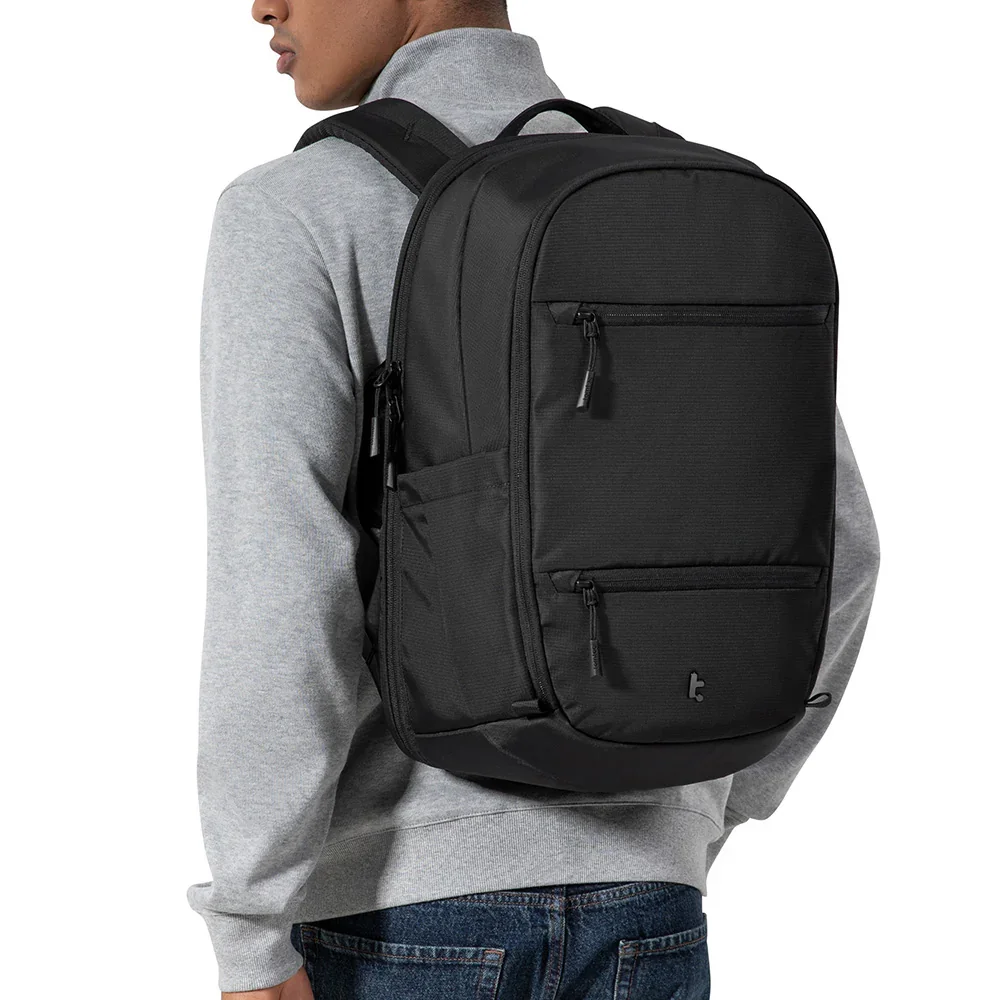 TomToc UrbanEX-T77 26L - worn on-body lifestyle shot showing carry fit
