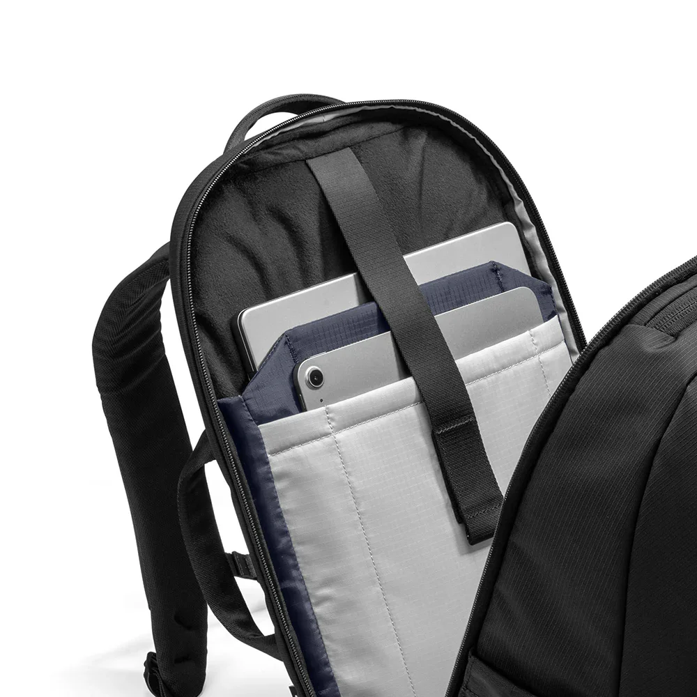 TomToc UrbanEX-T77 26L - padded laptop sleeve compartment close-up with tablet and laptop