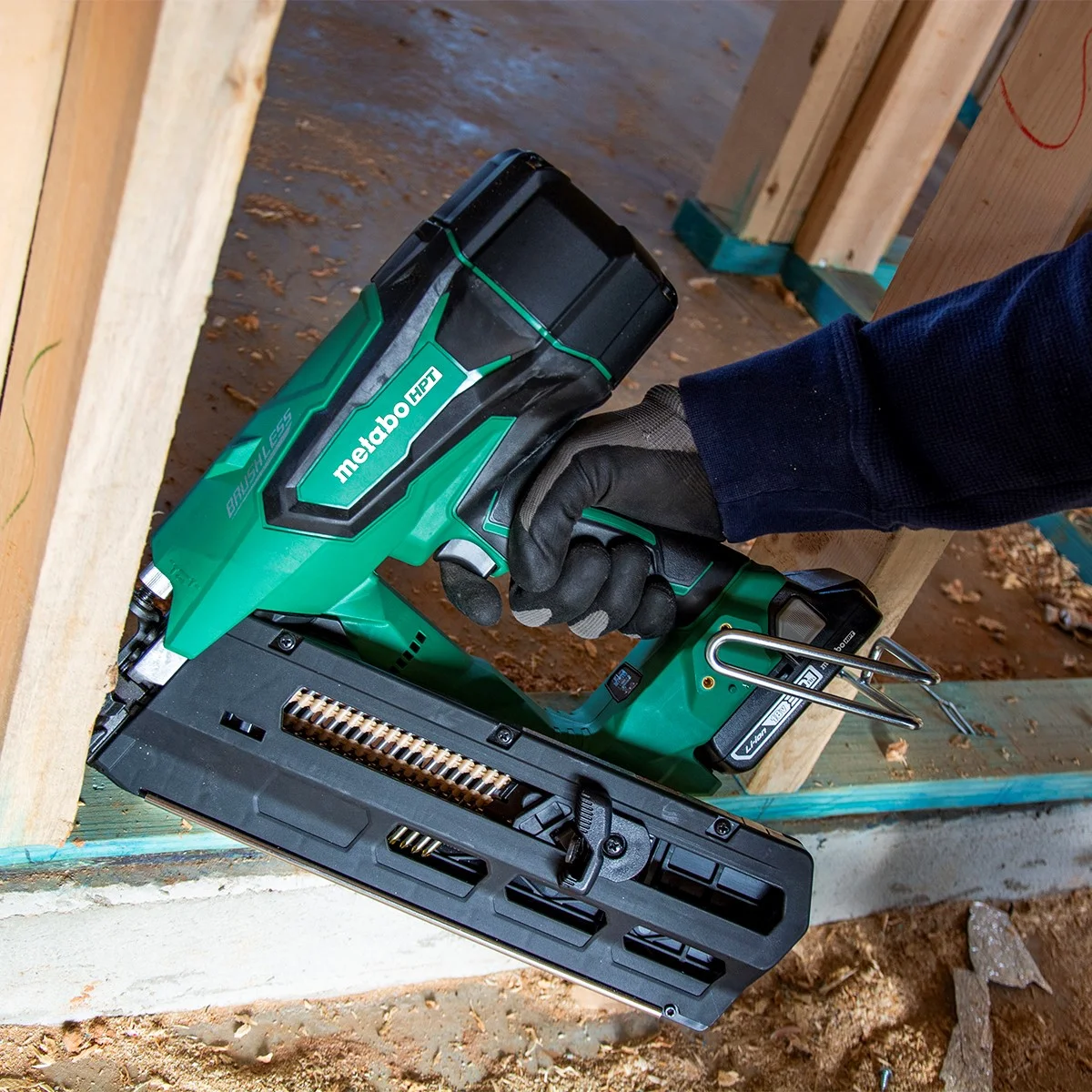 Metabo HPT NR1890DRA framing nailer in use nailing lumber framing on a construction site