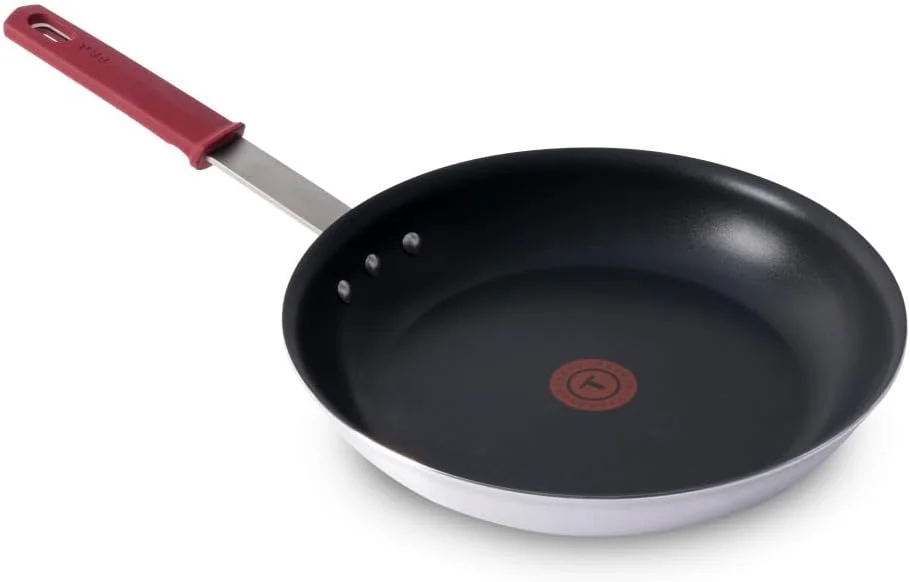 T-fal Titanium nonstick fry pan shown from a slightly different angle, highlighting the riveted stainless handle and Thermo-Spot indicator