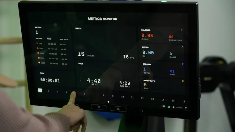 Aviron Strong Series metrics monitor display showing split, watts, and calorie data