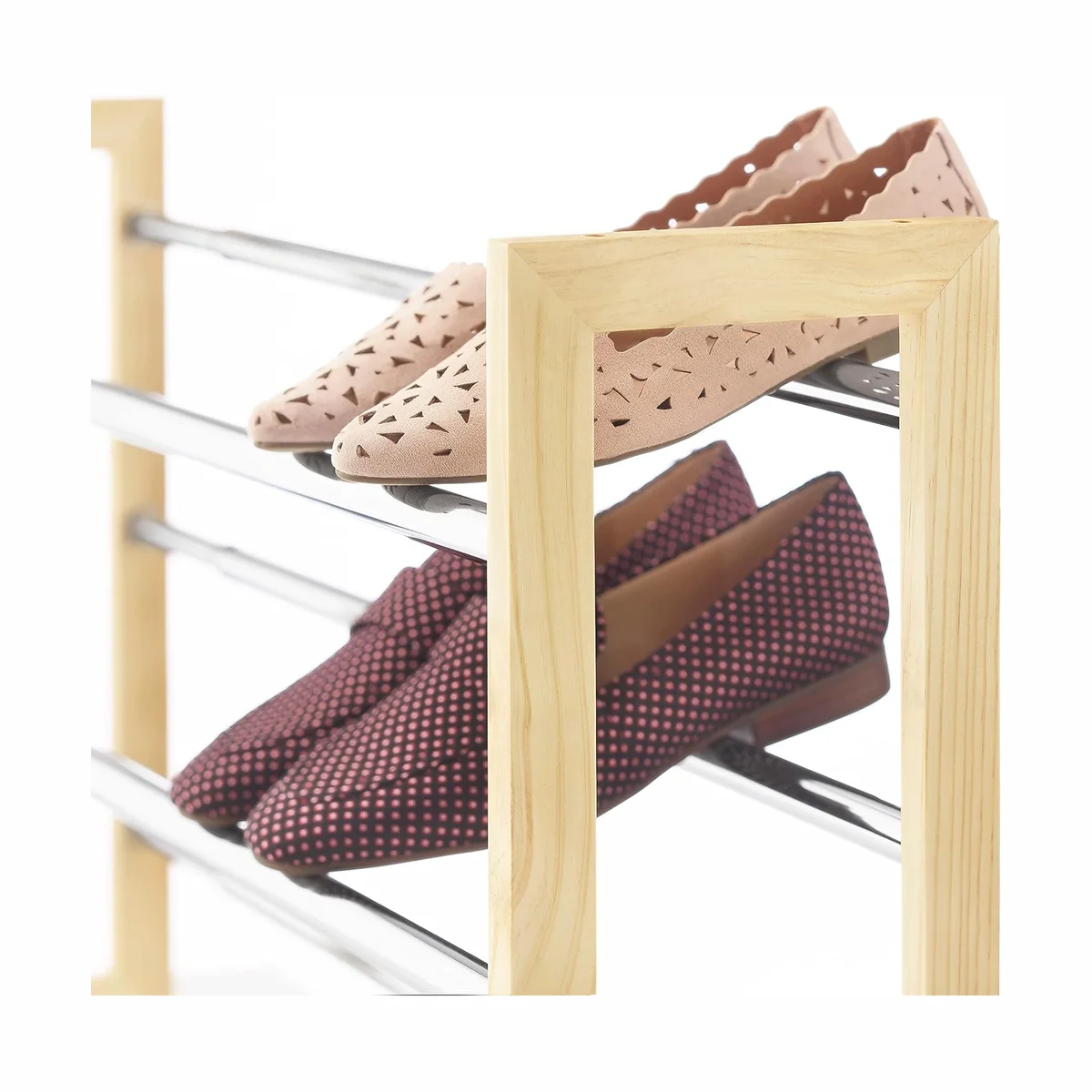 Close-up of the Whitmor shoe rack's natural pine end frame and chrome-finish steel bars holding two pairs of flats