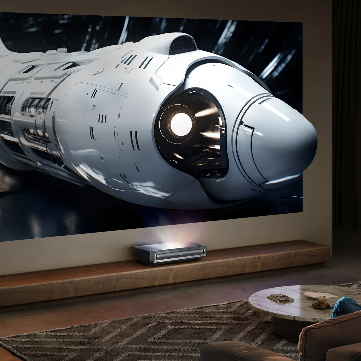 Hisense PX3-Pro projecting a large, detailed sci-fi scene onto a wall screen in a home theater setup