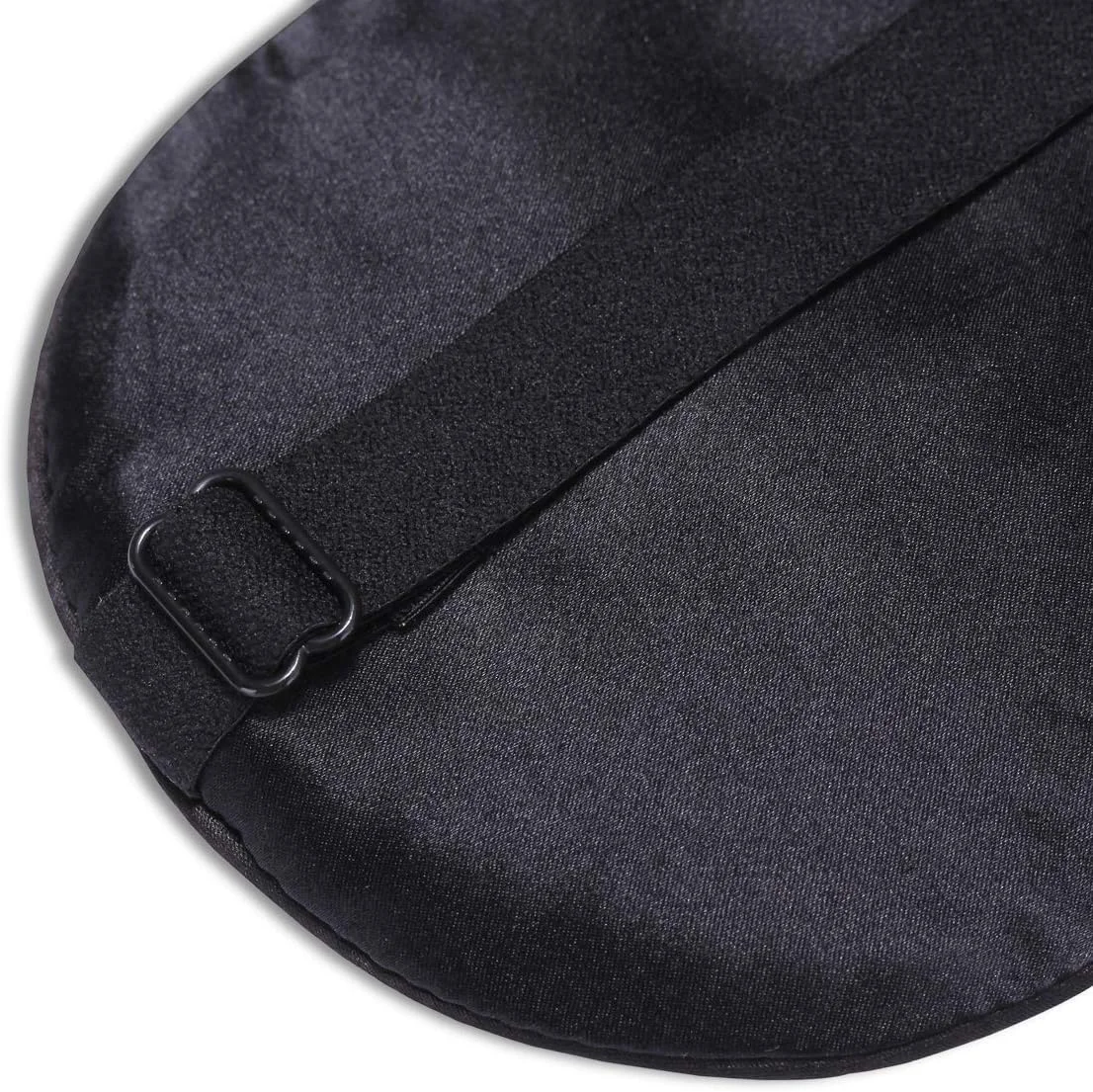 Close-up of the Alaska Bear Natural Silk Sleep Mask adjustable strap slider buckle and quilted silk edge