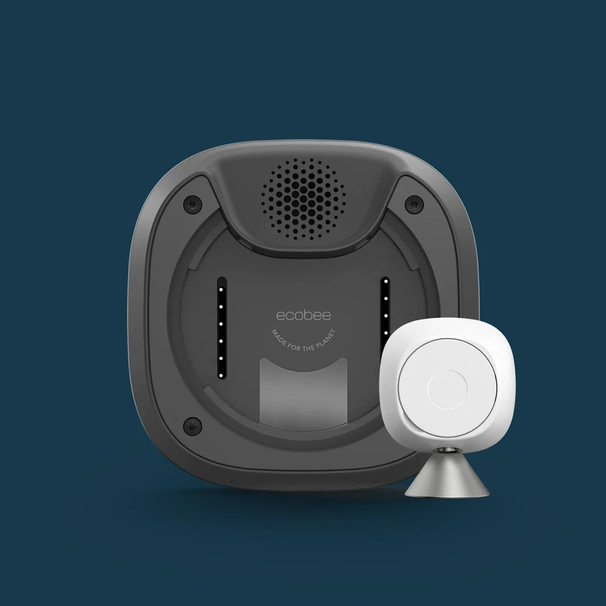 Ecobee Smart Thermostat Premium rear mounting plate with wiring terminals and speaker grille, shown alongside the included SmartSensor