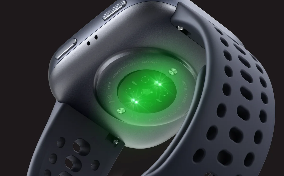 Close-up of the Amazfit Bip 6 underside BioTracker health sensor with green PPG light illuminated