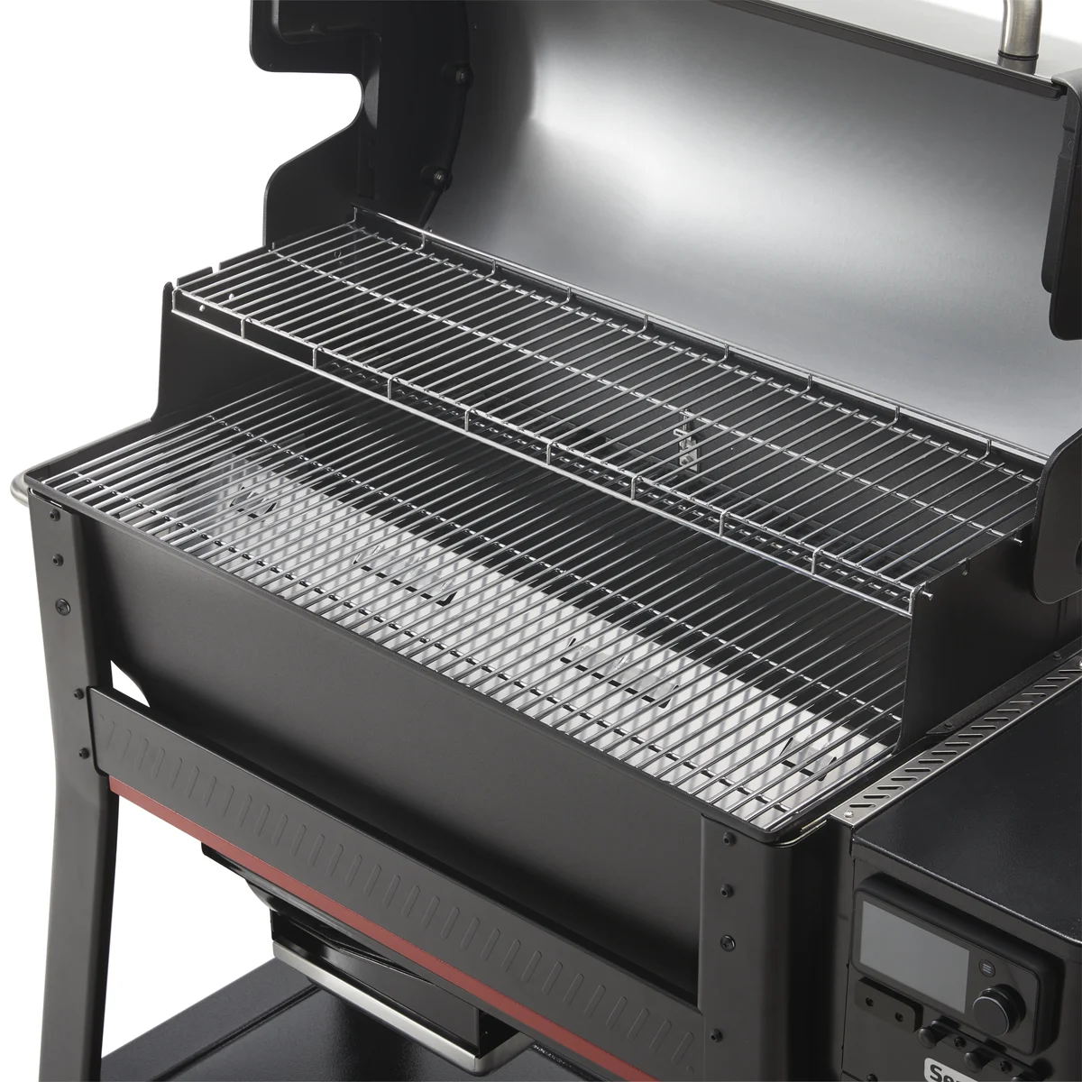 Weber Searwood XL 600 with lid open showing the stainless steel cooking grates and warming rack