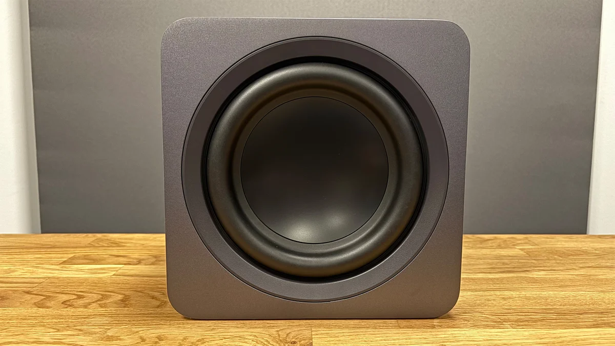 Samsung HW-Q990F cube subwoofer front face showing 8-inch woofer driver
