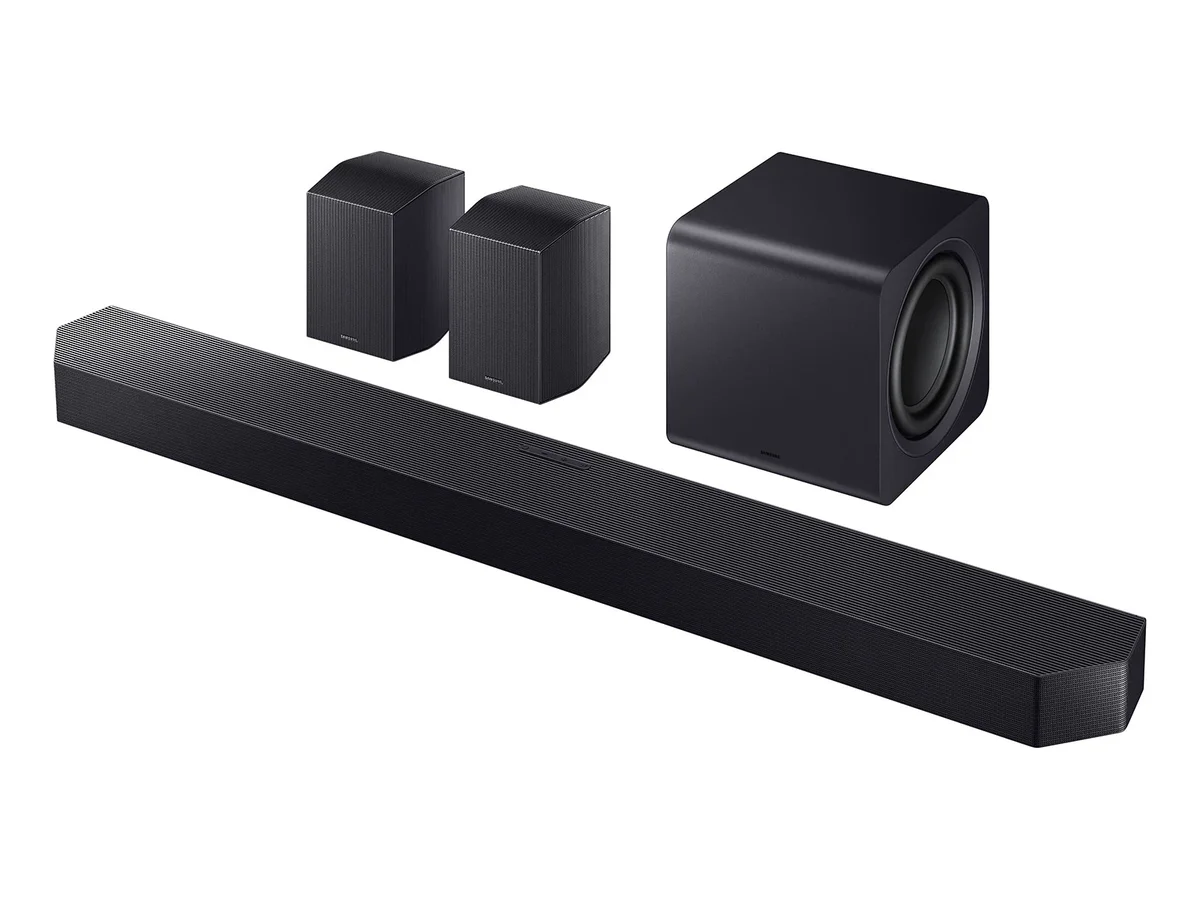 Samsung HW-Q990F full system — soundbar, cube subwoofer, and rear speakers in 3/4 angle view