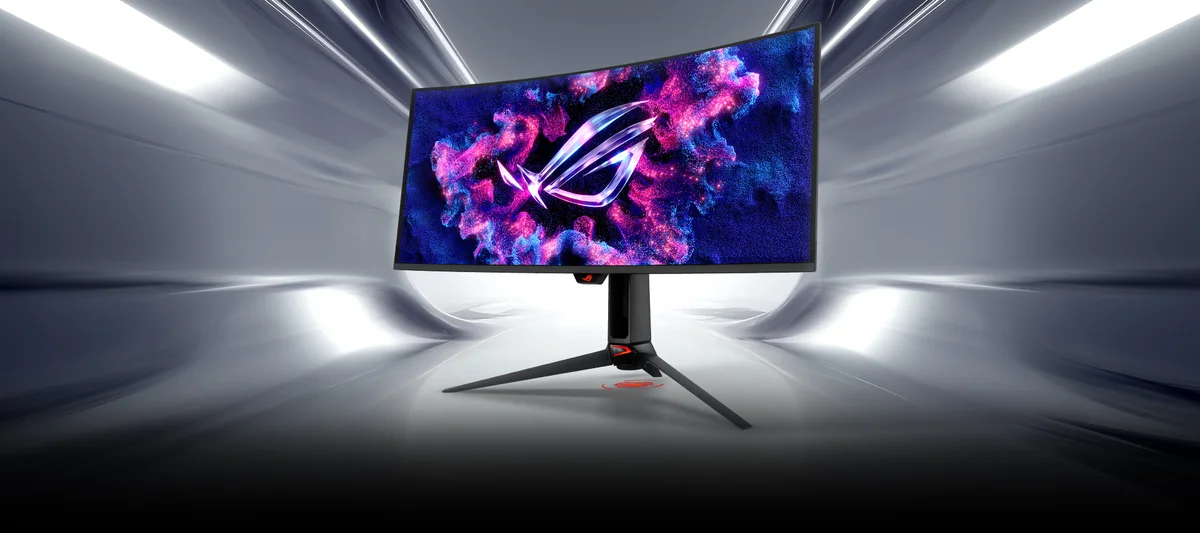 ASUS ROG Swift OLED PG34WCDN curved ultrawide monitor on dramatic tunnel stage, 3/4 angle