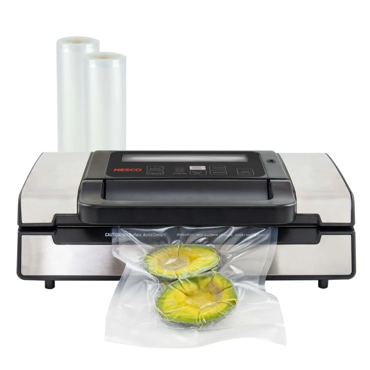 Nesco VS-12 vacuum sealer sealing avocado halves in a bag, with two bag rolls included