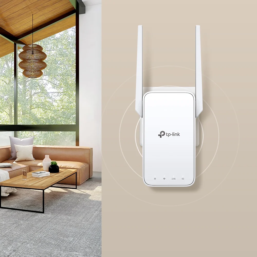TP-Link RE315 plugged into a wall outlet in a living room setting