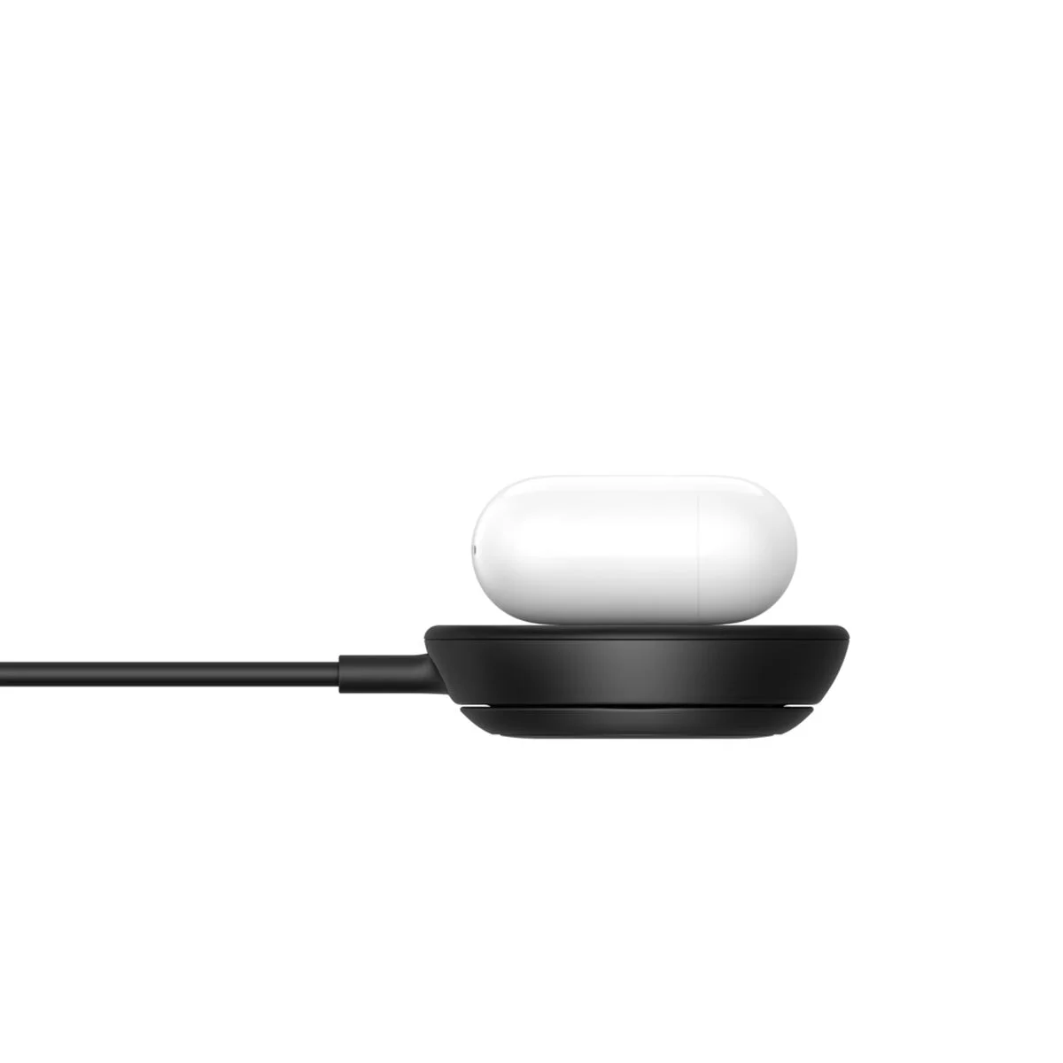 Belkin UltraCharge Magnetic Charger from the side wirelessly charging an AirPods case