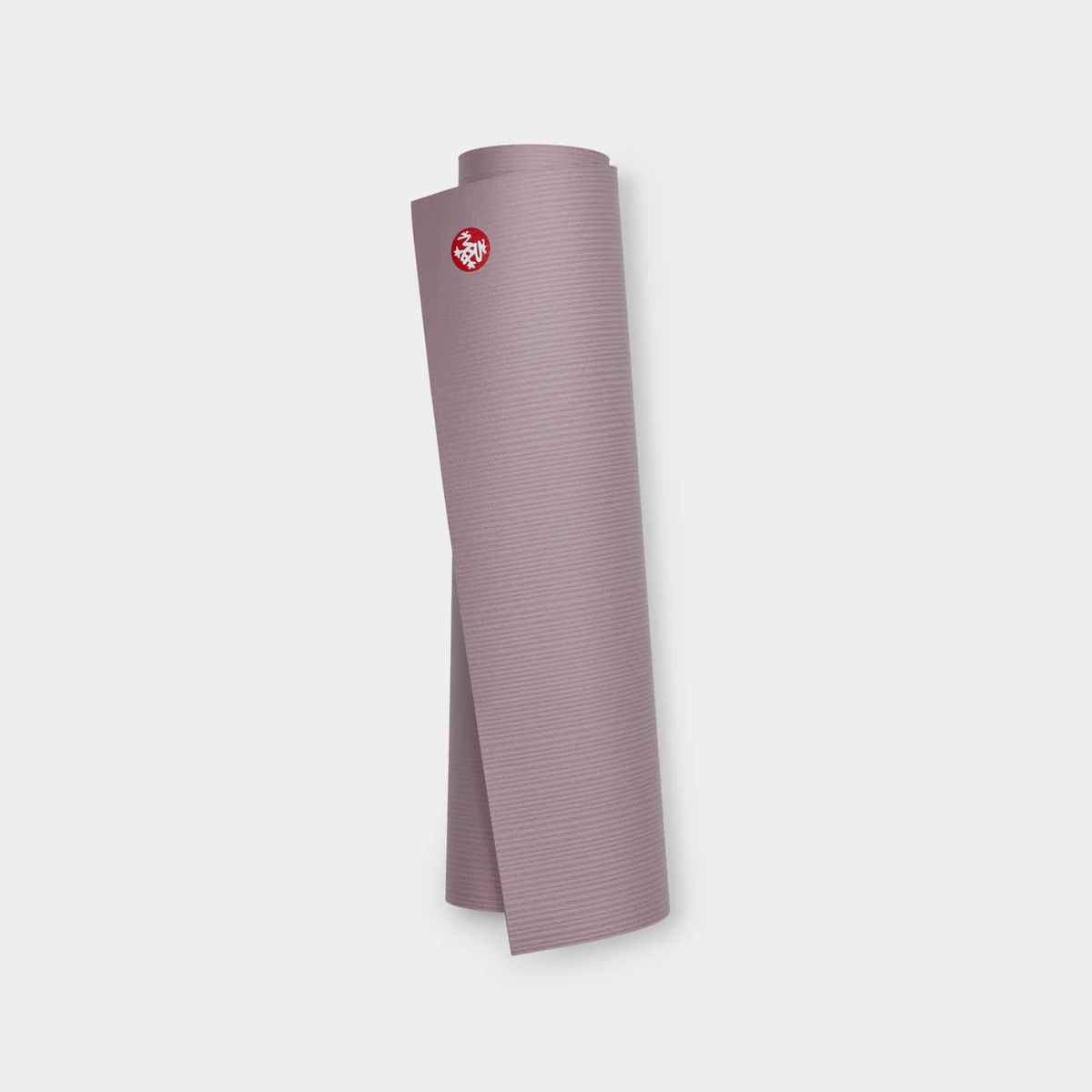 Manduka PRO yoga mat rolled up, Elderberry colorway, 3/4 angle view